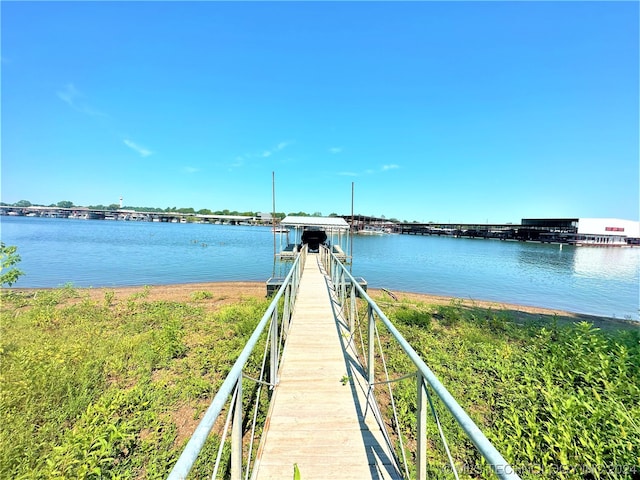 view of dock with a water view