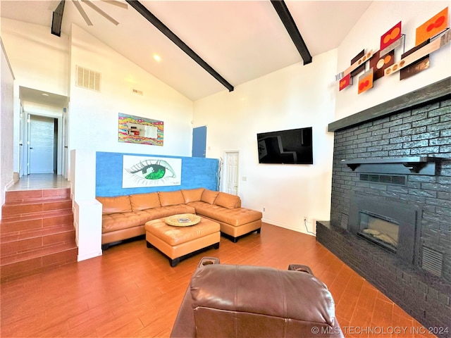 living room featuring a fireplace, hardwood / wood-style floors, beam ceiling, high vaulted ceiling, and ceiling fan