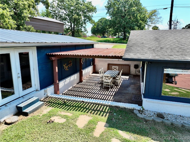 view of yard with an outbuilding and a patio area