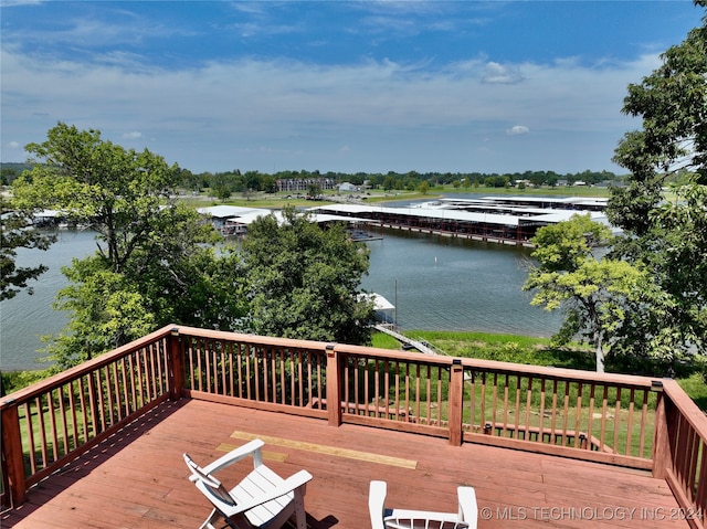 deck featuring a water view