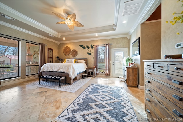 bedroom featuring light tile floors, crown molding, a tray ceiling, and ceiling fan