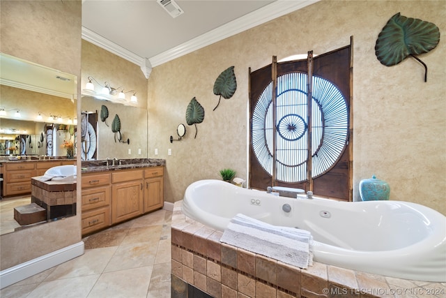 bathroom featuring ornamental molding, vanity, a relaxing tiled bath, and tile flooring