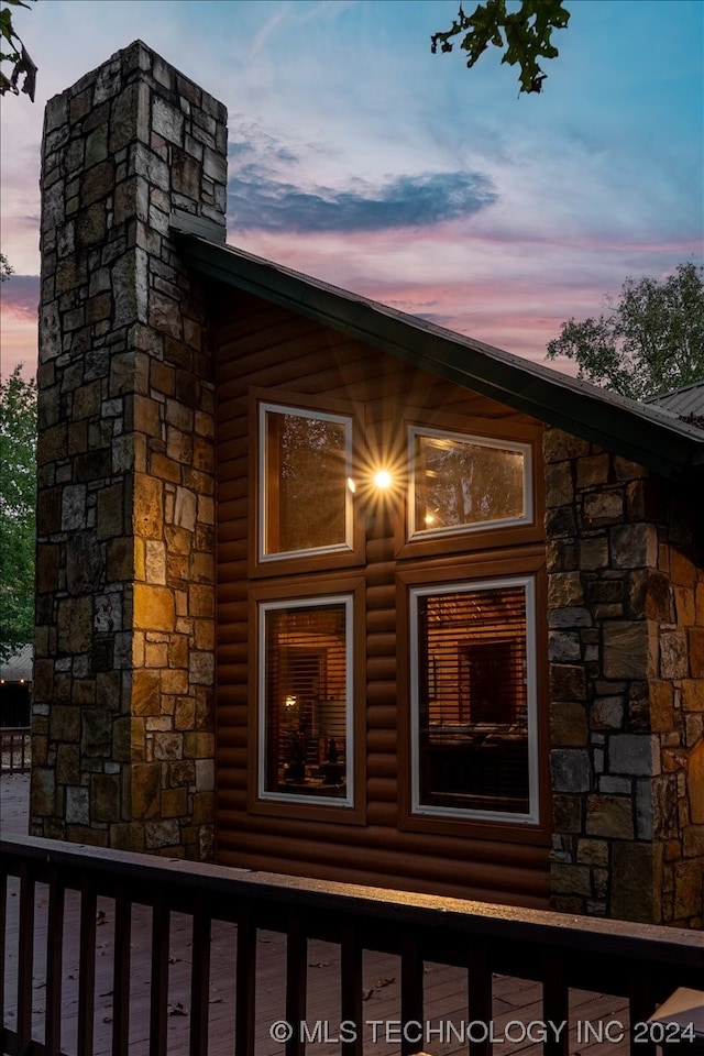 view of property exterior at dusk