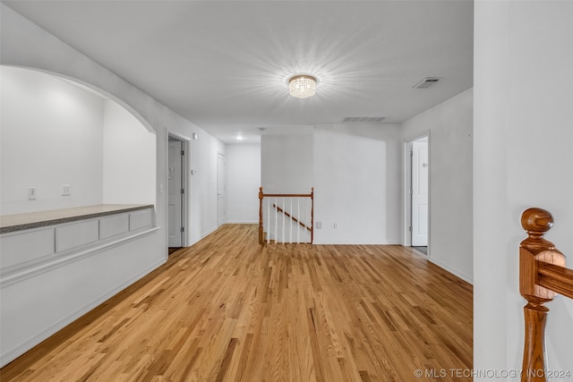 unfurnished room with light hardwood / wood-style flooring