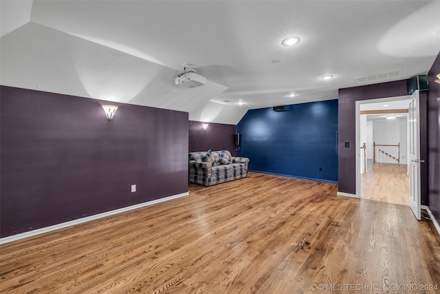 basement featuring light hardwood / wood-style flooring