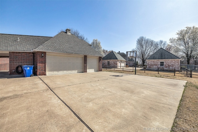 exterior space featuring a garage