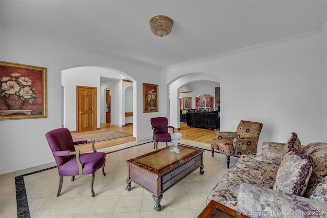 tiled living room featuring ornamental molding