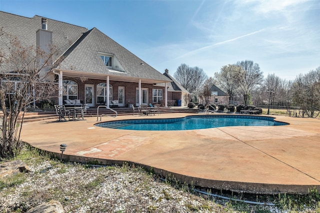 view of pool with a patio