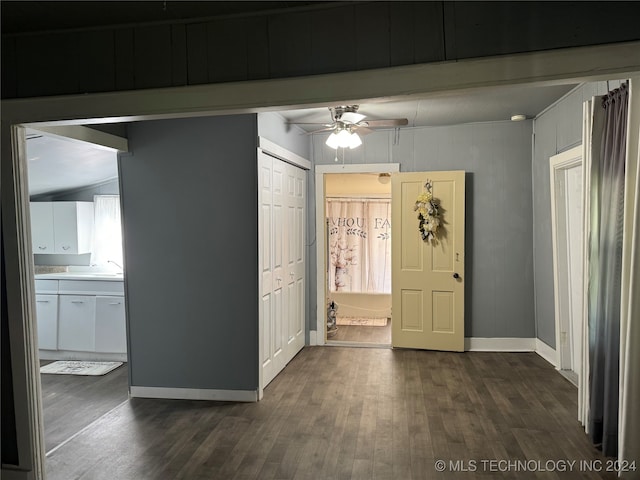 interior space with hardwood / wood-style floors and beamed ceiling