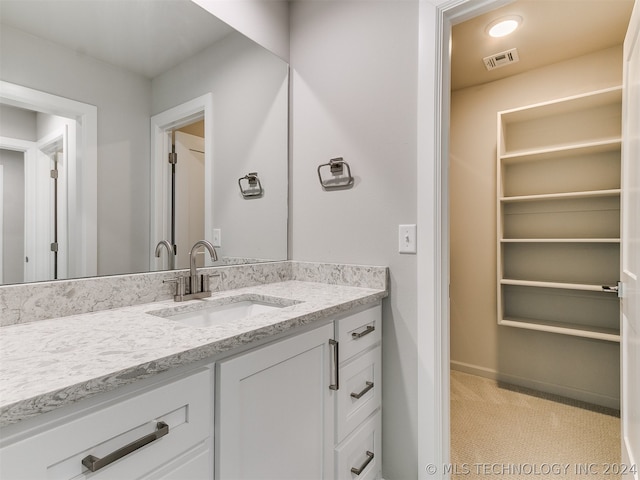 bathroom with large vanity