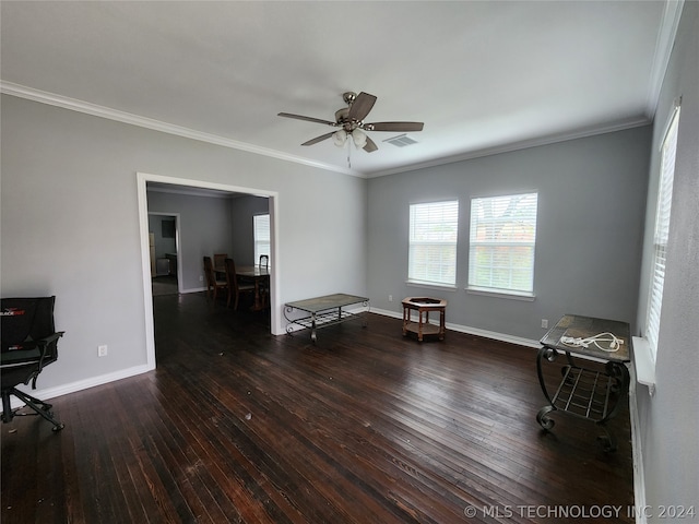 sitting room with ceiling fan, dark hardwood / wood-style floors, and crown molding