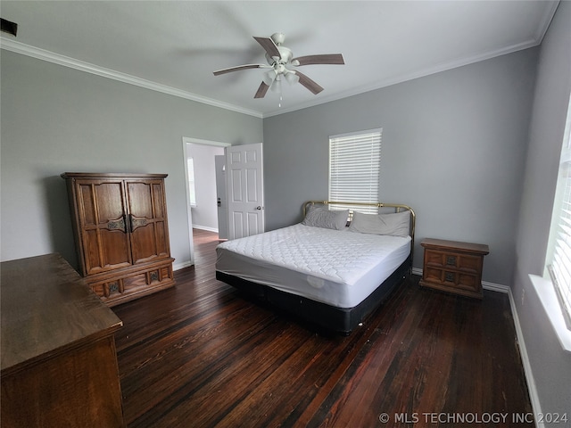 bedroom featuring dark wood-type flooring, ceiling fan, and multiple windows