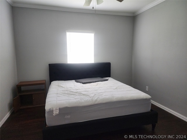 bedroom with ceiling fan and crown molding