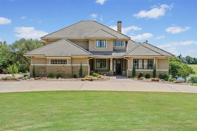 view of front of house with a front yard