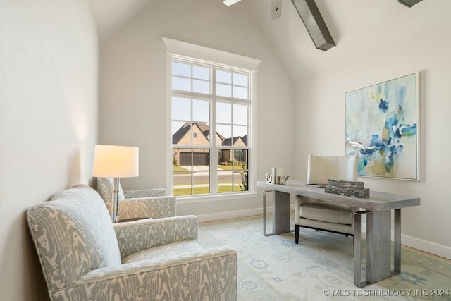 office space with vaulted ceiling and ceiling fan