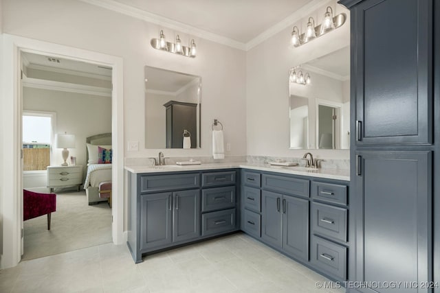 bathroom featuring vanity, ornamental molding, and tile patterned floors