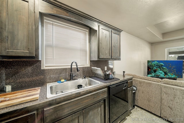 kitchen with a sink, dark brown cabinets, dishwasher, tasteful backsplash, and dark countertops