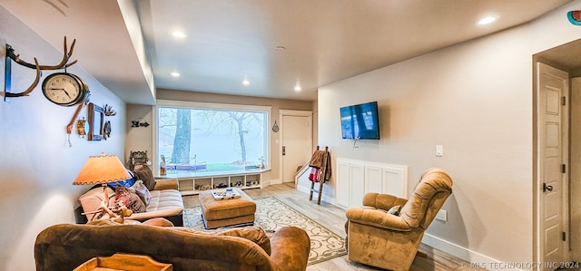 living room with light hardwood / wood-style floors