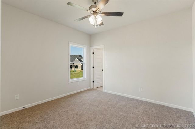 carpeted empty room with ceiling fan