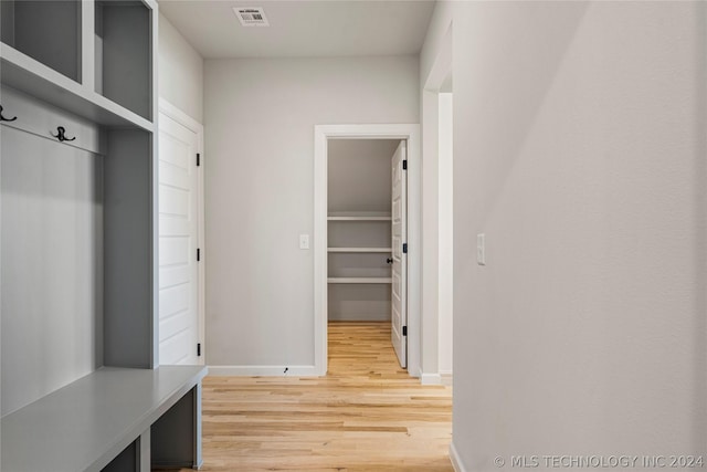 mudroom with hardwood / wood-style flooring