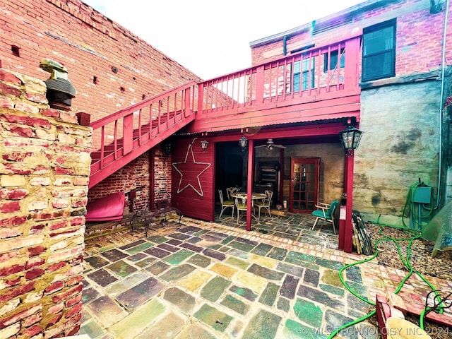 back of property featuring a patio and french doors