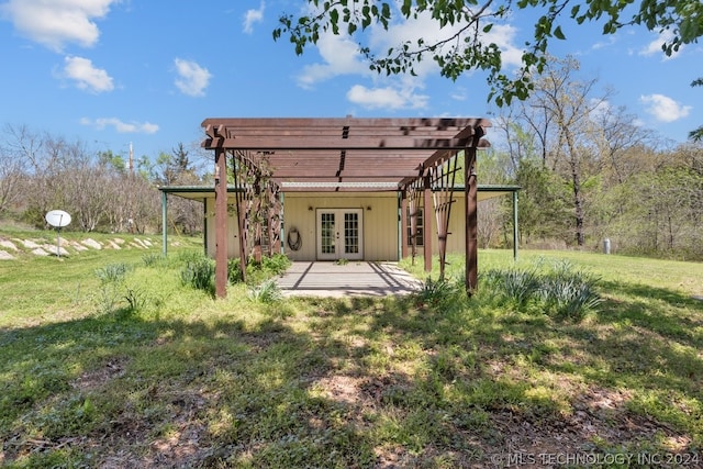 exterior space with a pergola and french doors