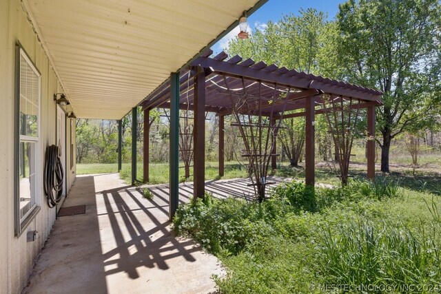 view of patio / terrace featuring a pergola