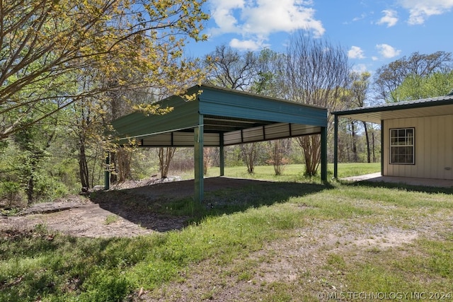 view of yard featuring a carport