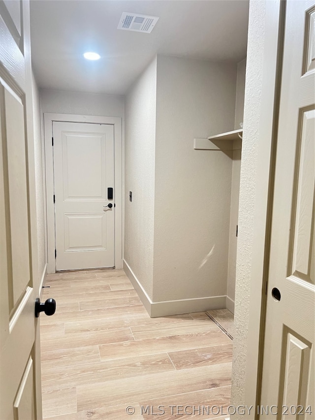 hall featuring light hardwood / wood-style flooring