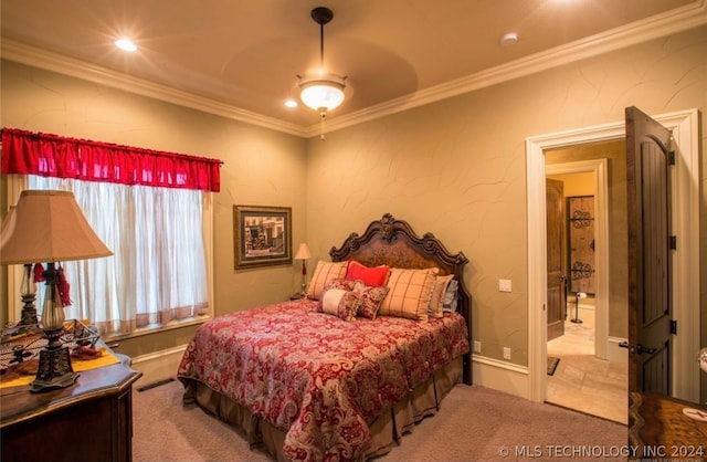 carpeted bedroom featuring crown molding and ceiling fan