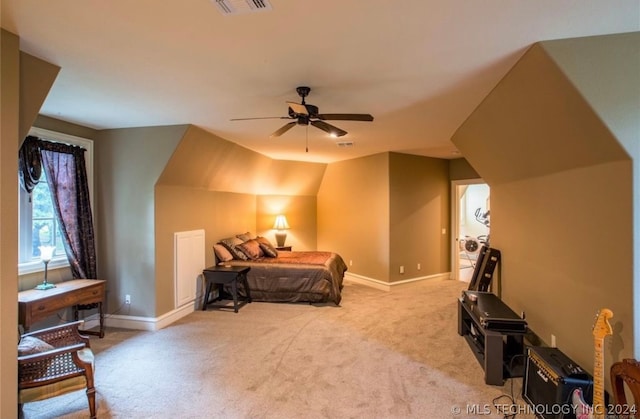 bedroom with light carpet, ceiling fan, and lofted ceiling