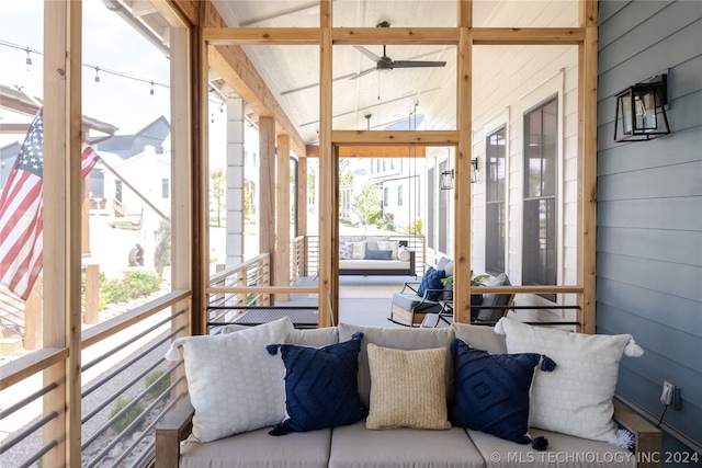 sunroom / solarium with ceiling fan