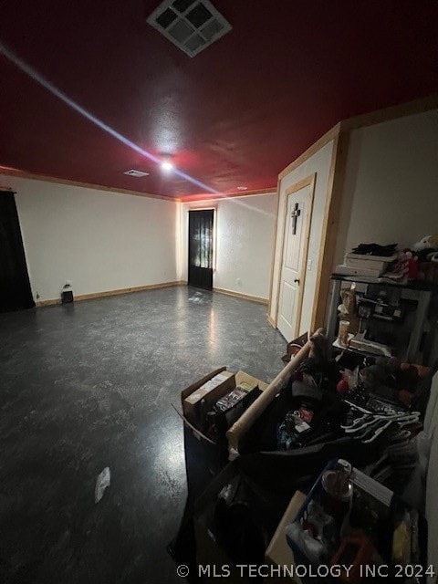 miscellaneous room with concrete floors