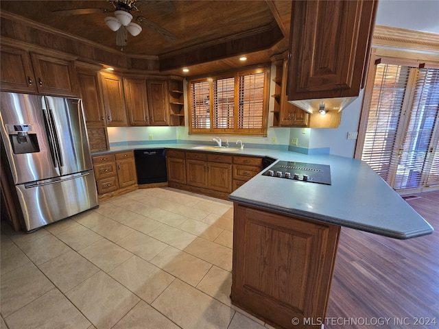 kitchen with black appliances, kitchen peninsula, sink, wood ceiling, and ceiling fan