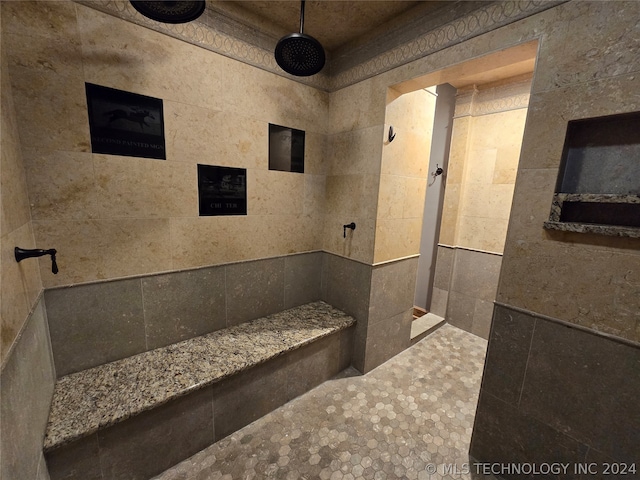 bathroom featuring tiled shower