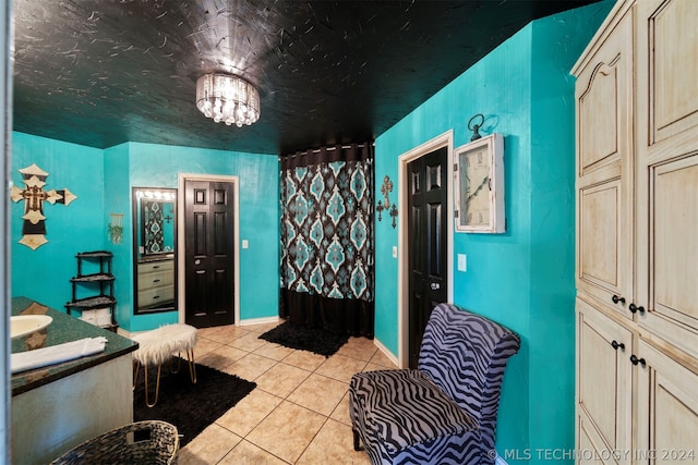 bathroom featuring tile floors and vanity