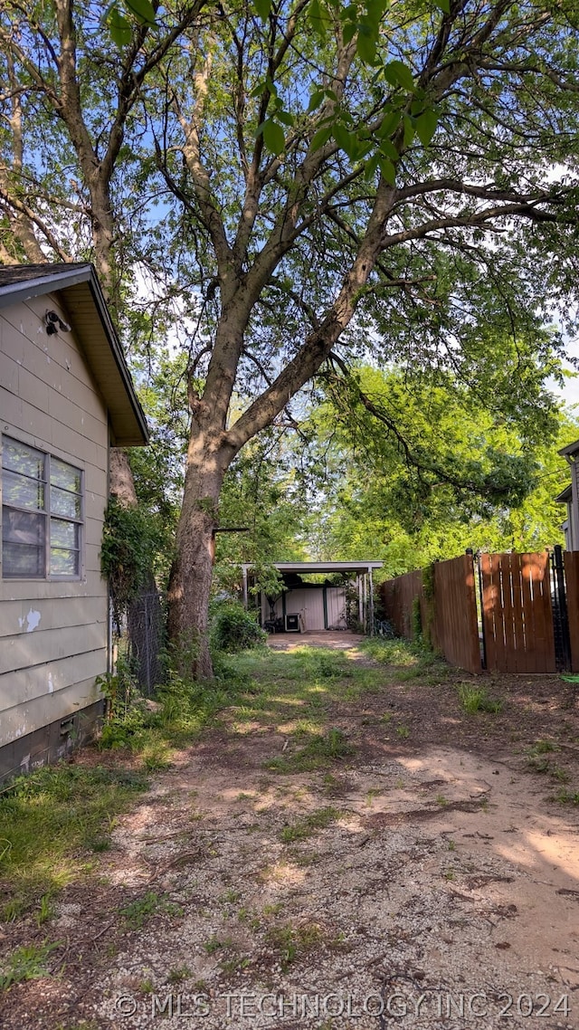 view of yard featuring a carport