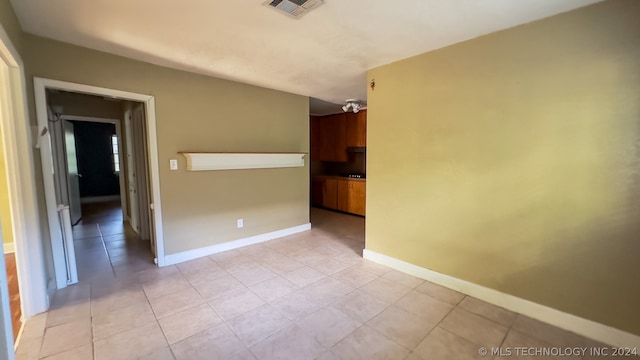 view of tiled spare room