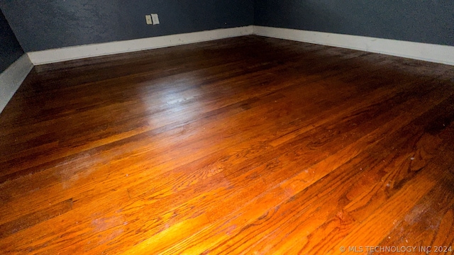 room details with dark hardwood / wood-style flooring