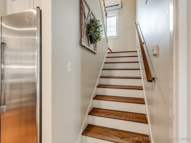 stairway with a wall mounted AC