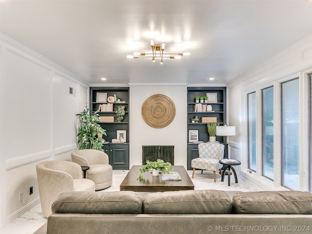 living room featuring a notable chandelier, crown molding, light tile flooring, and built in shelves