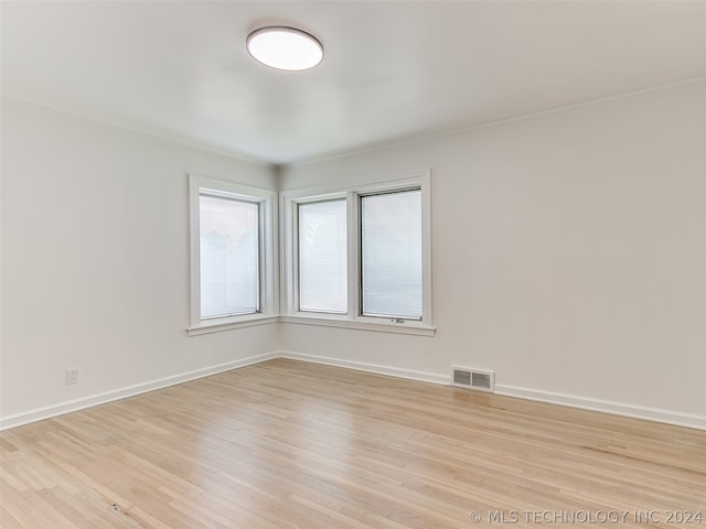 empty room featuring light hardwood / wood-style floors