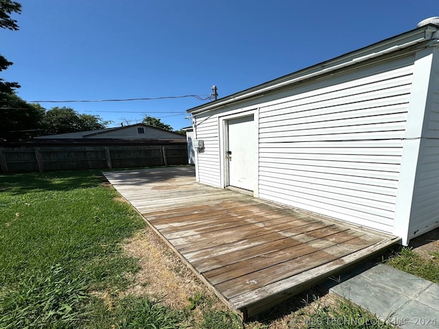 garage featuring a yard