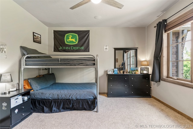 bedroom featuring ceiling fan and carpet flooring