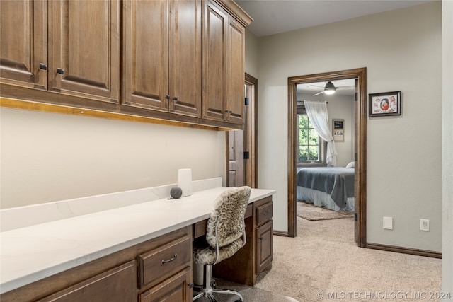 bathroom featuring ceiling fan and vanity