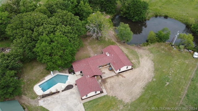 birds eye view of property featuring a water view