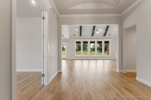 unfurnished living room with ornamental molding, lofted ceiling with beams, and light hardwood / wood-style flooring