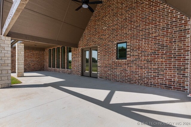 view of patio featuring ceiling fan