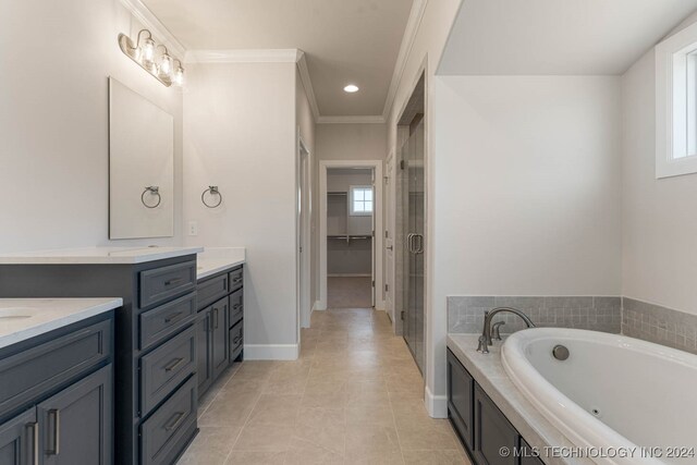 bathroom with crown molding, vanity, plenty of natural light, and tile patterned flooring