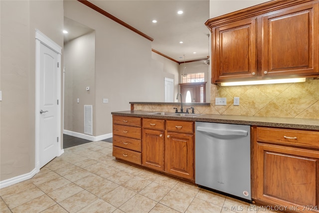 kitchen with light tile floors, sink, tasteful backsplash, stainless steel dishwasher, and ornamental molding